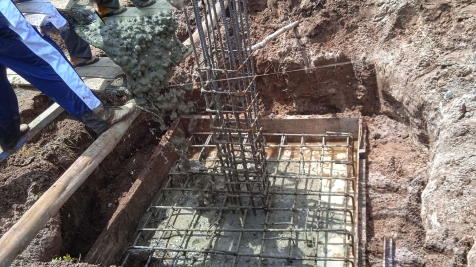 Concrete in steel form poured concrete in the building construction area on the mountain